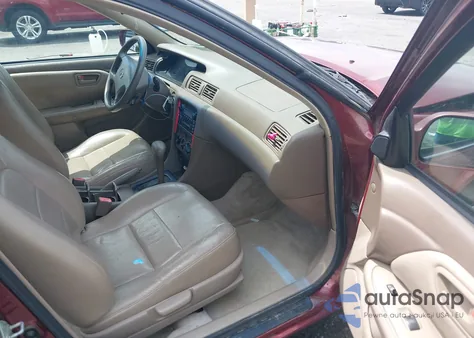 2000 Toyota Camry Le from USA, damaged, VIN JT2BG22K3Y0521541